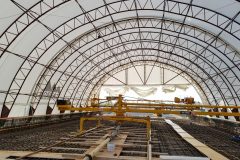 Flat Iron Construction’s set up before a concrete pour under the fabric building.